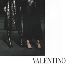 Valentino Print Ad, Two Female Models Dressed up in Black Leather Clothing