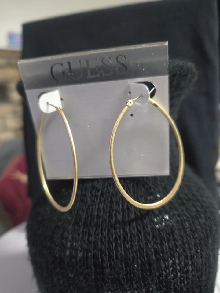 Pendientes de aro Guess tono dorado ovel Foto 2 de 2