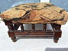 ANTIQUE RUSTIC UPHOLSTERED FOOTSTOOL DARK WOOD FRAME WITH TURNED SPINDELS