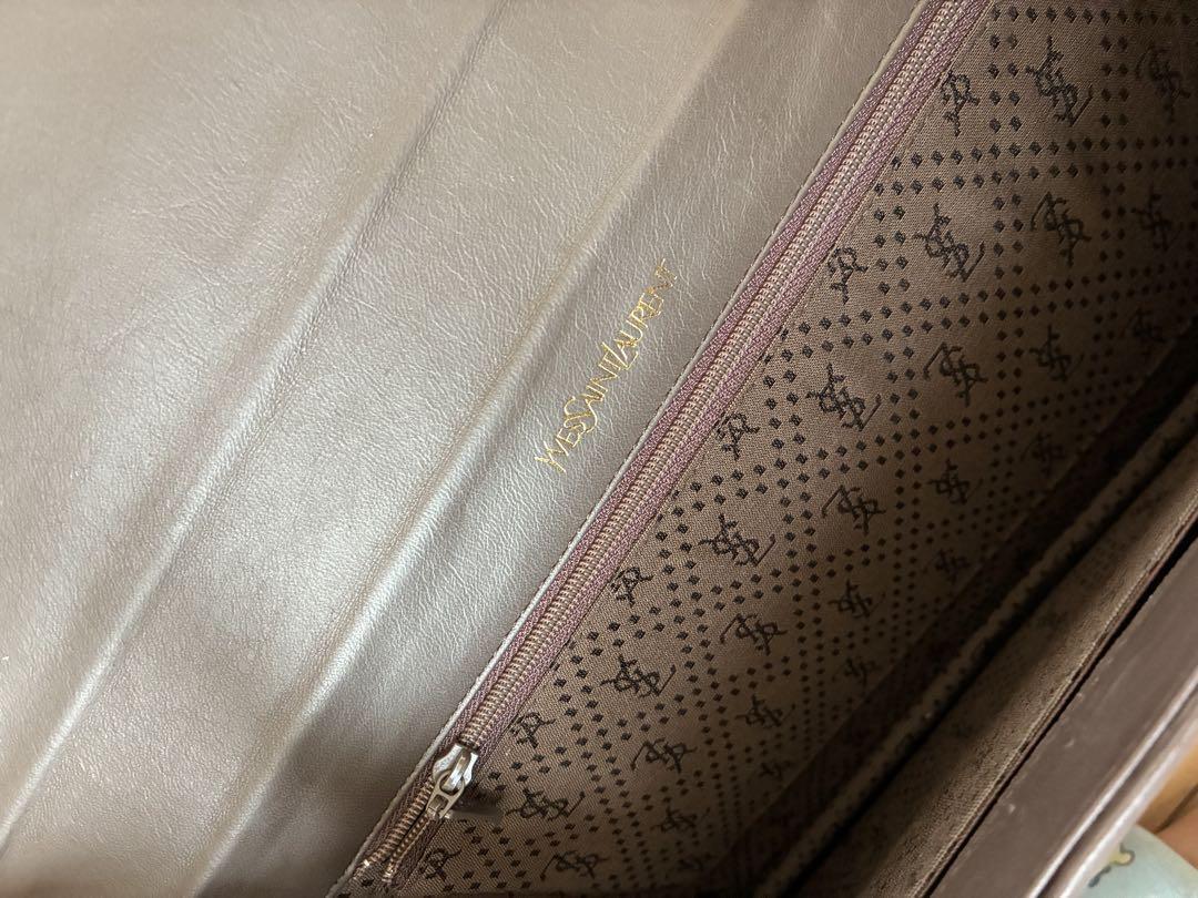 Pochette Yves Saint Laurent in pelle marrone nero beige lusso classica elegante