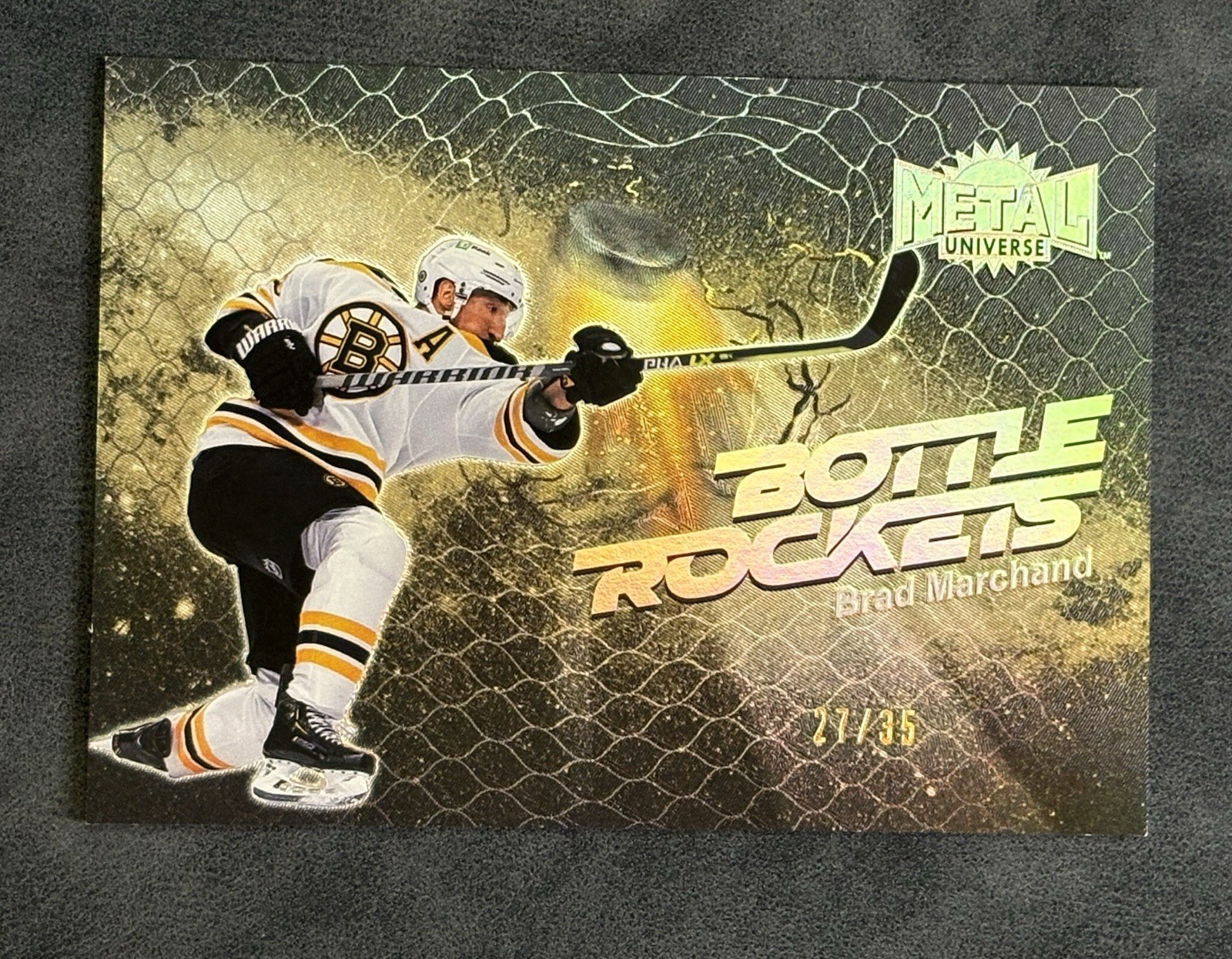 Brad Marchand 22-23 Skybox Metal Universe Bottle Rockets GOLD /35 #BR-14 Bruins