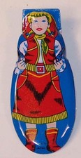 Vintage Tin Japanese Cowgirl Clicker