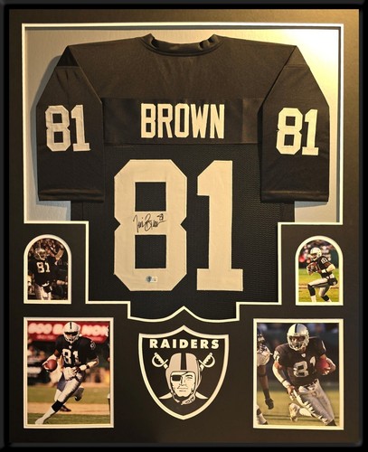 FRAMED OAKLAND RAIDERS TIM BROWN AUTOGRAPHED SIGNED JERSEY BECKETT HOLOGRAM - Picture 1 of 4