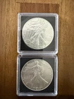 2 American Silver Eagle Coins 2007 & 2011 in plastic cases - 1 oz silver each
