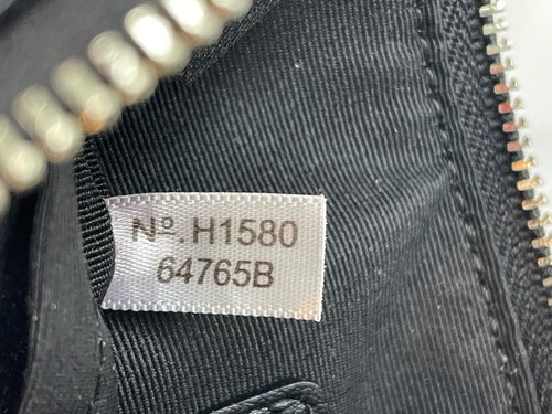 Coach kleine schwarze Handgelenktasche aus genarbtem Leder mit Lammfellbesatz #64765B - Bild 15 von 16