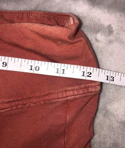 Free People Movement Hot Shot Kick Flares XS Orange Rust Split Front - Imagen 6 de 8