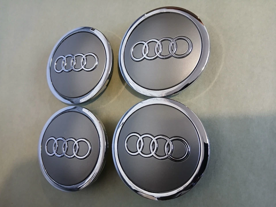 Juego (4 piezas) Tapacubos centrales llanta cromada gris Audi 69MM repuesto 4B0601170A Foto 2 de 4