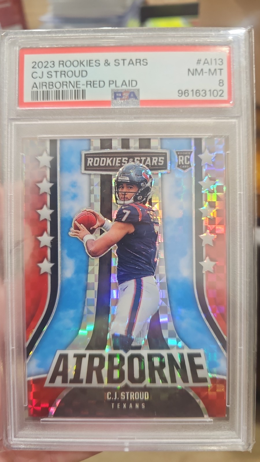 2023 Panini Rookies & Stars - Airborne C.J. Stroud #AI-13 Red Plaid Prizm (RC)
