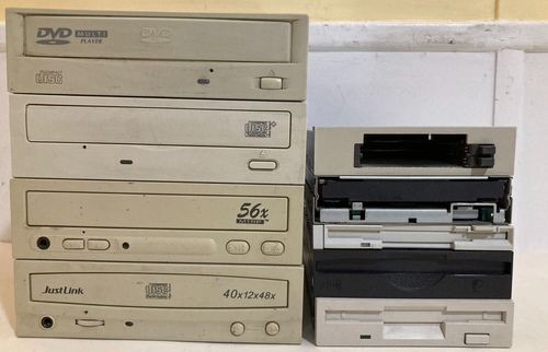 Mix 8 Lot: 4 Optical Drives~3 Floppy~Iomega Zip~PC Card Reader All Untested - 第 1/9 張圖片