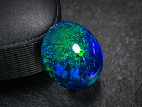 Piedra preciosa suelta cabujón ovalado ópalo negro etíope natural de 10,70 quilates 17,5 x 14 x 9 mm - Imagen 3 de 4