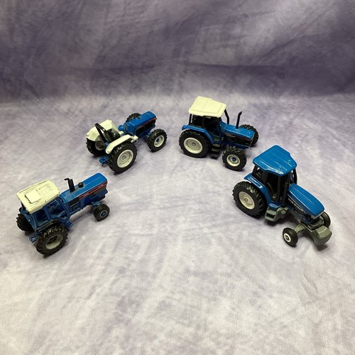 LOT OF 4 ERTL 1/64 Scale FORD New Holland TRACTORS TW35, 7840, 8870, 7740 - Picture 2 of 6