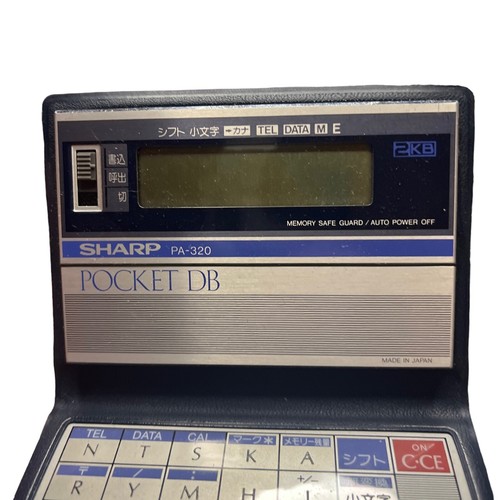 Vintage Sharp Pocket DB PA-320 Folding Electronic Date Book Calculator Poss. Neu im Karton - Bild 7 von 12