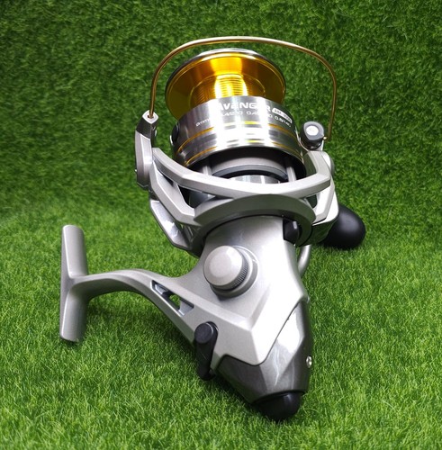 Okuma Avenger 4,5:1 Links-/Rechtshand Spinnrolle, gold/grau - ABF-8000 - Bild 4 von 6