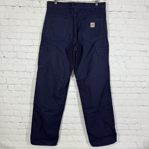 Pantalones de mezclilla Carhartt resistentes al fuego para hombre 34X32 azul marino calce suelto carpintero - Imagen 2 de 17