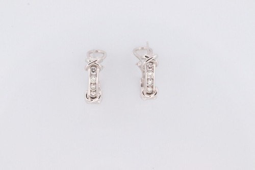 14k Diamond Hoop Earrings. Diamond Channel set diamond XOXO Earrings. 0.65ctw - Picture 3 of 7