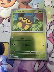 Seedot 013/132 Me01: Mega Evolution Reverse Holo