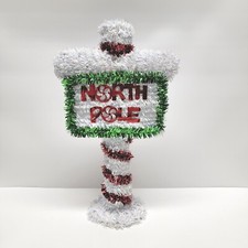 North Pole Winter Sign, Covered With Multi-Colored Garland
