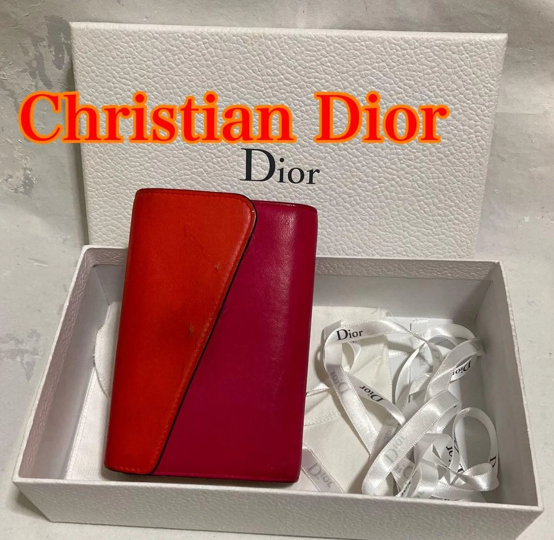 Portefeuille Christian Dior en cuir bicolore avec boite compact France comme