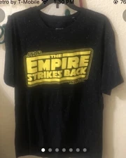 Empire Strikes Back T Shirt Yellow Logo With White Stars All Over Black Shirt