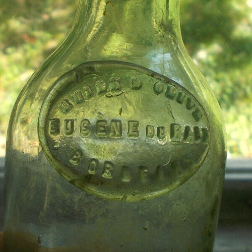 BOTELLA DE ACEITE DE OLIVA BURDEOS HUILE D'OLIVE EUGENE DU RAIX SELLO APLICADO CRUDO DÉCADA DE 1870 - Imagen 2 de 8