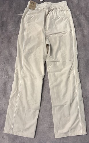 Nike Pantaloni Donna Windrunner Vita Alta Tessuto Orlo Aperto Marrone |FV7655-110| - Foto 2 di 2