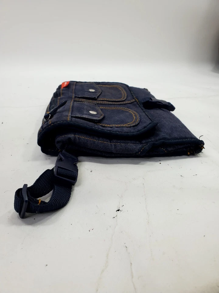 Almohadilla cambiadora de pañales portátil para bebé SKIP HOP alfombrilla bolsillos de mezclilla Foto 3 de 4