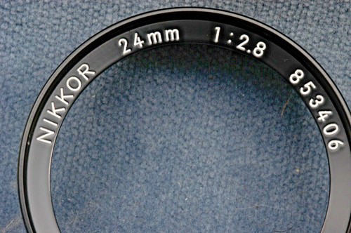 NIKKOR 24MM F2.8 FRONT LENS RING ONLY, NEW OLD STOCK REPAIR PART - Picture 3 of 3