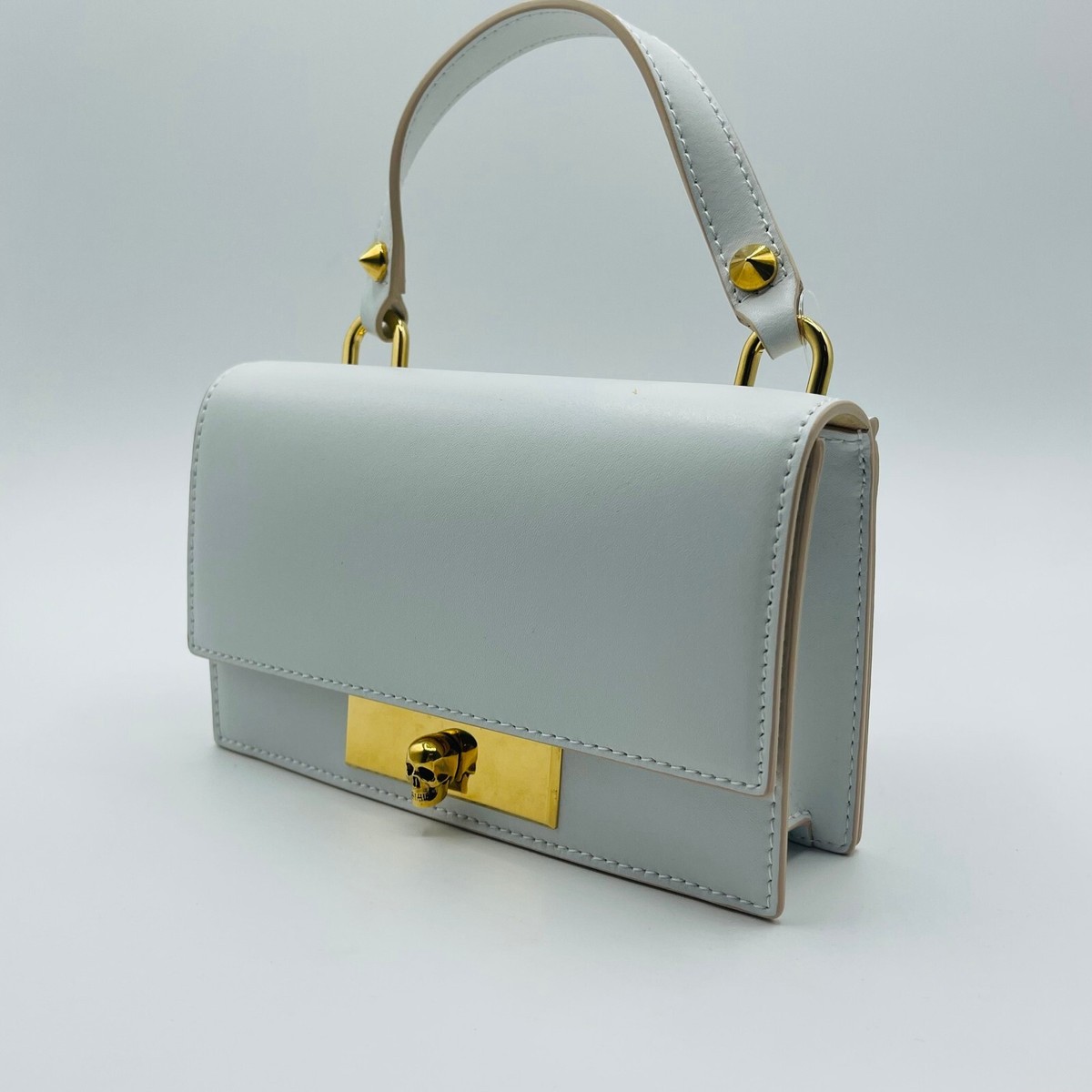 ALEXANDER MCQUEEN ヒクハックミニクロスホティハック $1290 Alexander McQueen Ivory Leather Mini Skull Lock