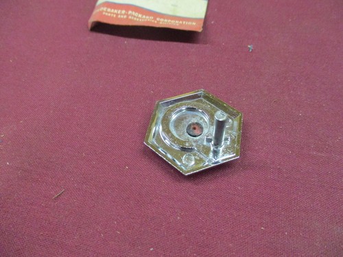 1955 Packard Clipper Trunk Lock Emblem 466422 NOS - Picture 2 of 2