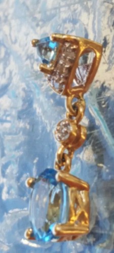 Colgante de topacio azul ovalado y corte de billón y diamante oro amarillo liso de 14 quilates - Imagen 4 de 12