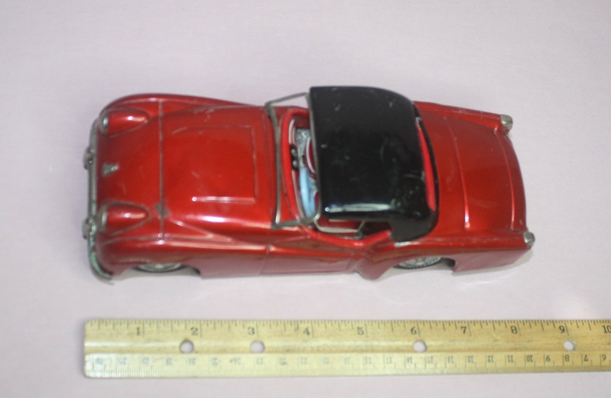 VINTAGE 1960'S BANDAI TRIUMPH TR3 - TOY TIN FRICTION CAR RED