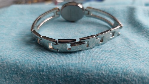 Lorus ladies watch with gold coloured shoulders and silver bracelet style strap - Picture 7 of 13