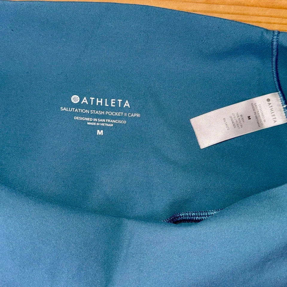 Leggings Capri Athleta Salutation Stash Pocket II Azul Talla M Yoga Correr Foto 2 de 4