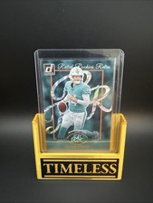 2025 Panini Donruss Football - Quinn Ewers (RC) Rated Rookies Retro #13 Dolphins
