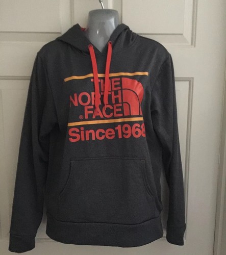 orange north face sweater