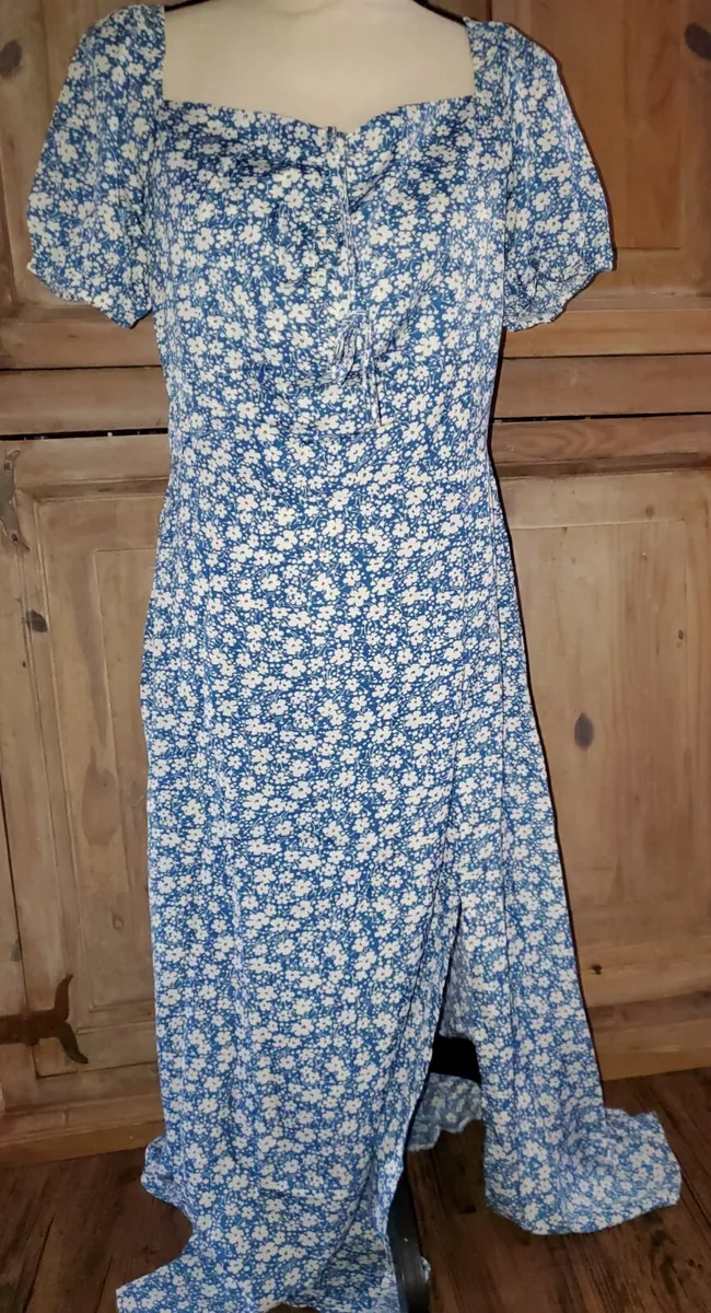 Blue dress with store white flowers