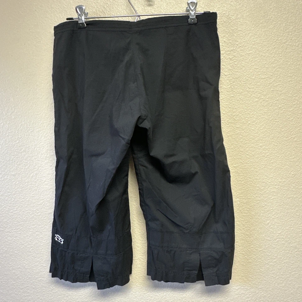 Pantalón de Yoga Be Present XS Recortado Abertura Lateral Negro Bolsillos Cómodo Elástico Foto 3 de 4