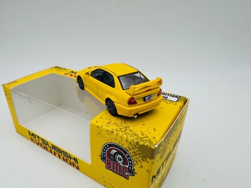 BM 1:64 MITSUBISHI LANCER EVO V AND VI YELLOW - Imagen 4 de 4