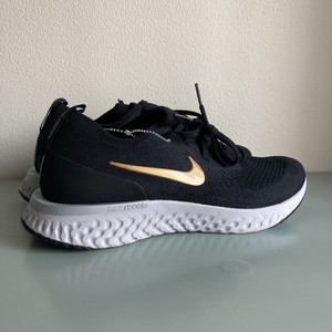 nike epic react flyknit grey black gold