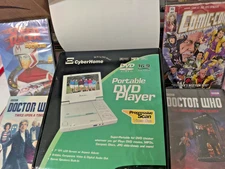 Tested Cyberhome 7" DVD Player + 4 NEW DVDs – Doctor Who/Speed Racer - Deus Ex
