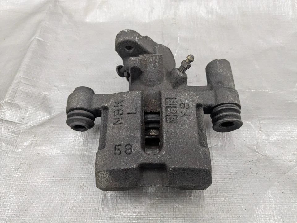 Pinza de freno trasera izquierda Mazda Miata 1994-2000 OEM NA75-26-61Z 94-00 Foto 2 de 4