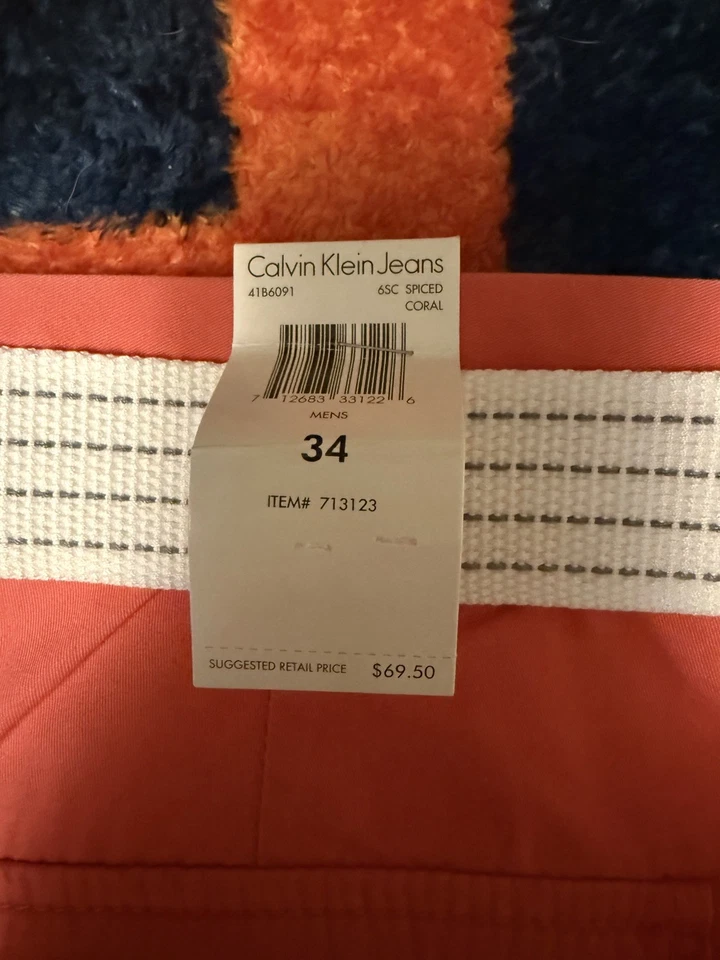 Pantalones Cortos Chinos Calvin Klein Para Hombre 34 Cinturón Frente Plano 9” Entrepierna Coral NUEVO CON ETIQUETAS Foto 2 de 4