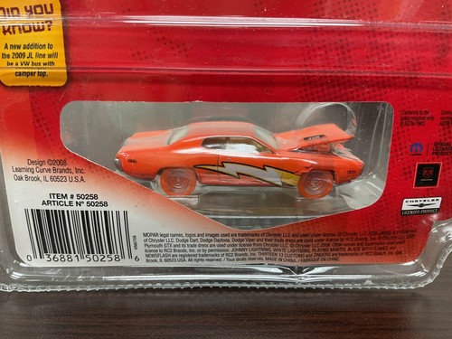 Johnny Lightning-Lightning Rods 1971 Plymouth GTX Orange NIP Bonus Magnet 1/2500 - Picture 7 of 8