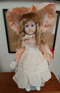 porcelain doll stands