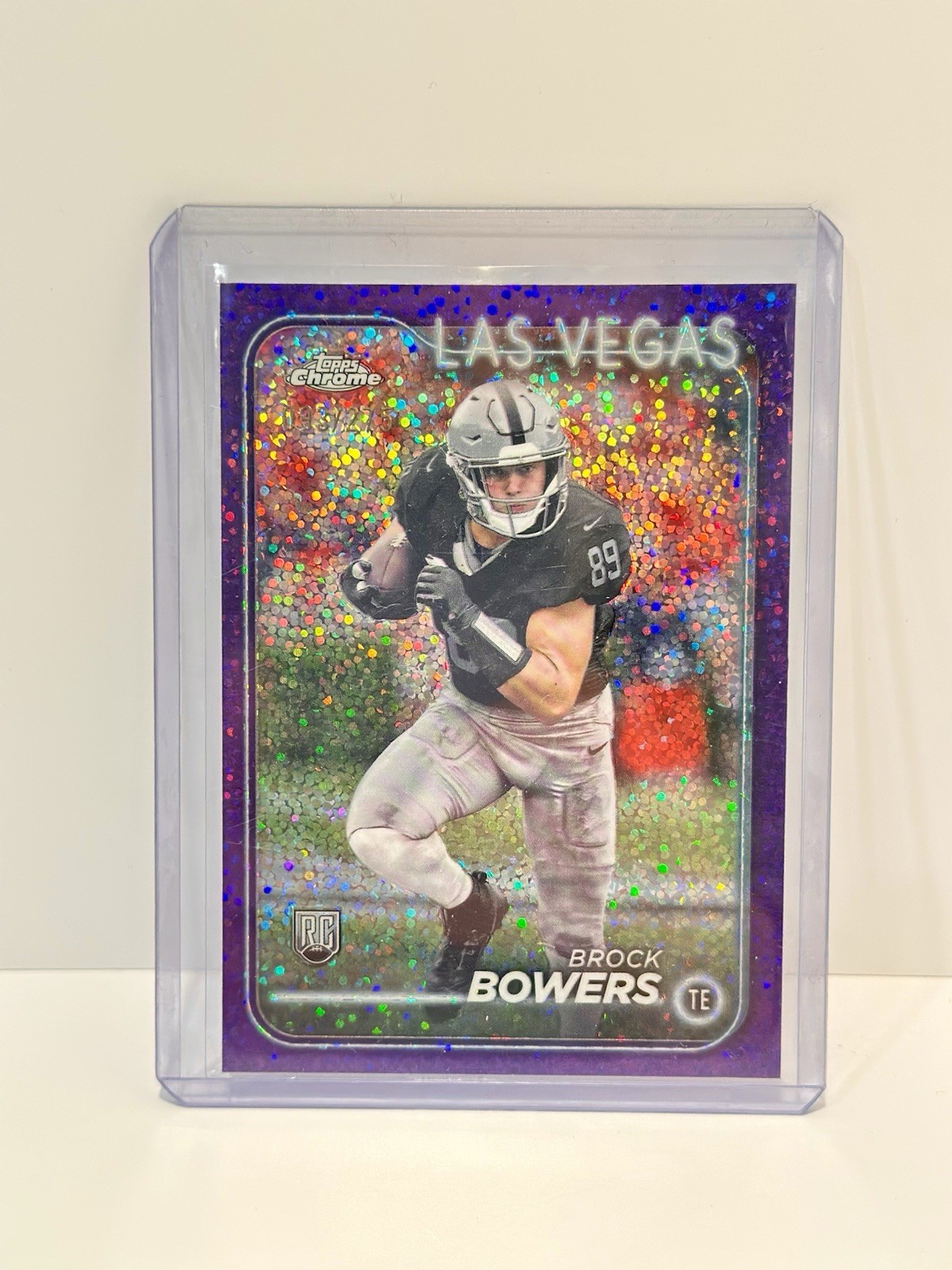 2024 Topps Chrome - Rookies Brock Bowers #207 Purple Speckle Refractor /275 (RC)