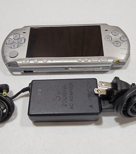 Official Sony Silver PSP 3000 with upgraded battery and charger - Picture 1 of 4