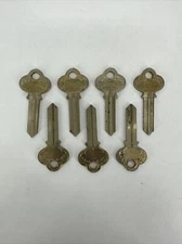 LOT OF 7 Original Vintage P&F Corbin Ornate Brass Key Blanks