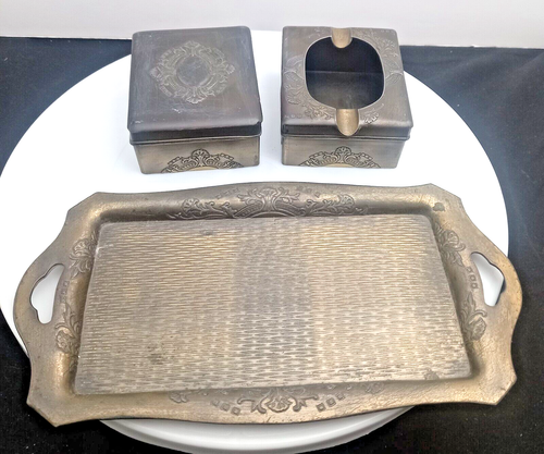 JUEGO DE FUMAR LATÓN DORADO DE COLECCIÓN: CENICERO, CAJA DE CIGARRILLOS Y BANDEJA 10,5" c1970 g. - Imagen 3 de 12