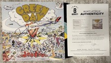 GREEN DAY SIGNED DOOKIE VINYL BILLIE JOE, TRE COOL AND MIKE DIRNT - BECKETT LOA