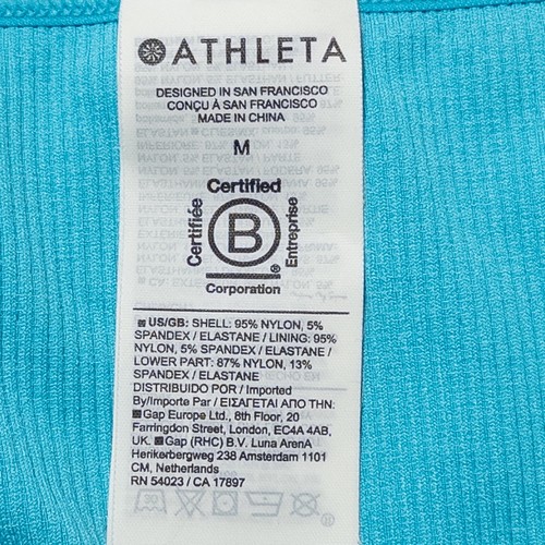 Camiseta sin mangas Athleta Aurora sin costuras corta para mujer mediana Santorini azul yoga activo - Imagen 7 de 8